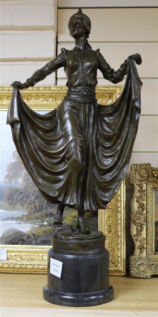 A modern bronze of a medieval lady